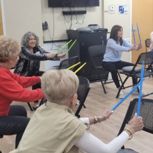 Cardio drumming session is a perk of membership